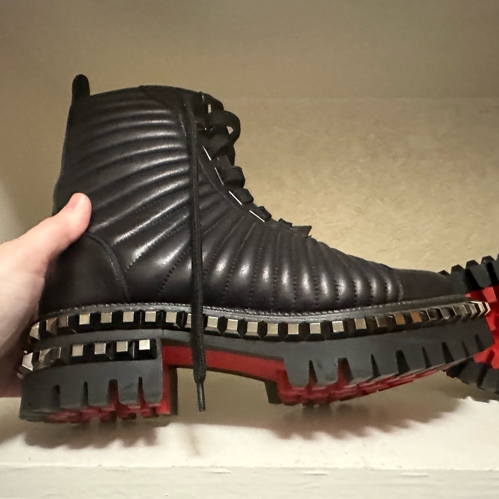 CHRISTIAN LOUBOUTIN
Calfskin Quilted Yetota Combat Boots